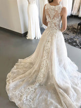 Illusion Lace Ball Gown Wedding Dress with Appliques and Sweep Train